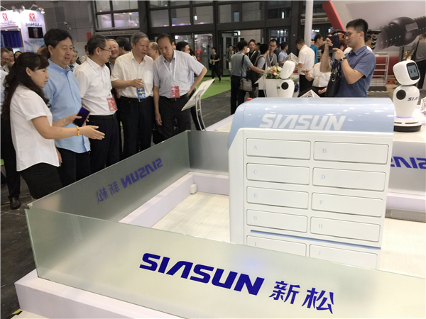 1531189962974359.jpg 展会现场_副本.jpg